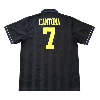 Black sports jersey with 'Cantona' and number '7' on the back