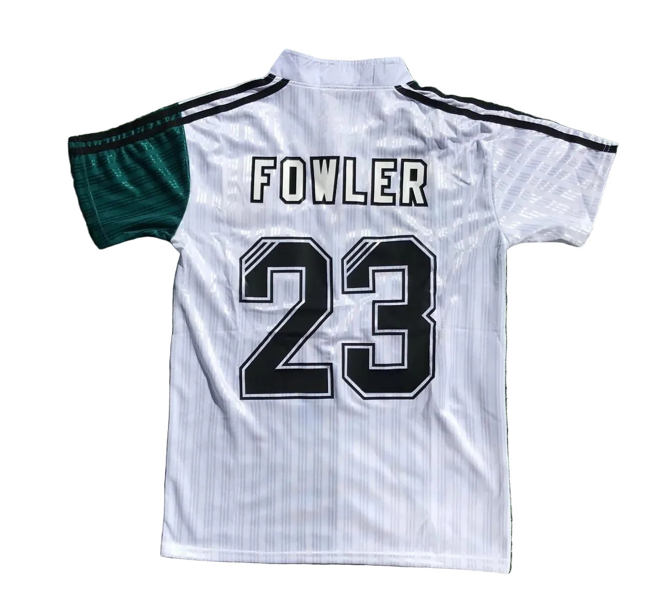 White sports jersey with 'Fowler 23' on a grass background