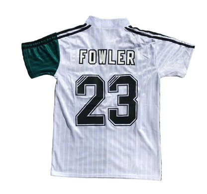 White sports jersey with 'Fowler 23' on a grass background
