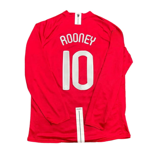 Red sports jersey with 'Rooney' and number '10' on a grass-like surface