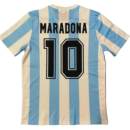 Soccer jersey with 'Maradona 10' on a wooden surface