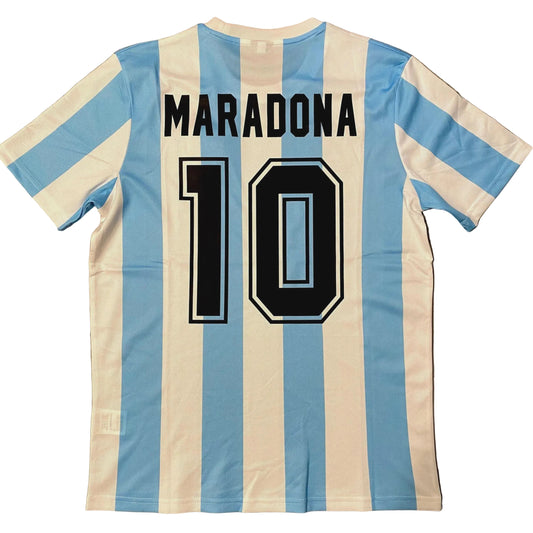 Soccer jersey with 'Maradona 10' on a wooden surface