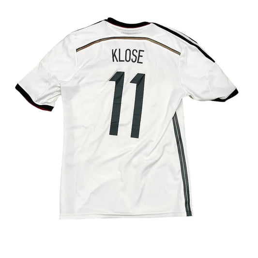 White soccer jersey with 'KLOSE' and number '11' on a green grass background