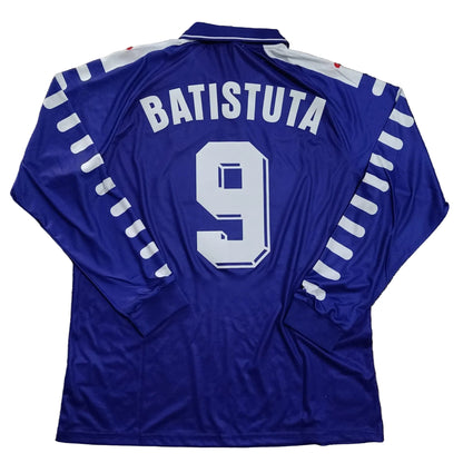 Blue sports jersey with 'Batistuta' and number '9' on a brown textured surface