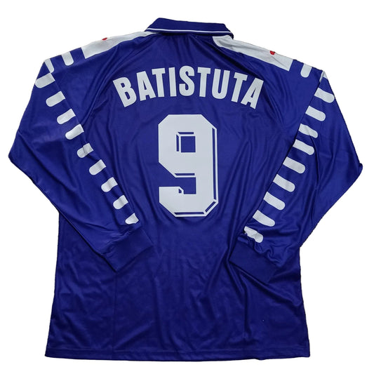 Blue sports jersey with 'Batistuta' and number '9' on a brown textured surface