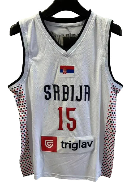 White basketball jersey with 'SRBIJA' and number '15' on a hanger against a light gray background
